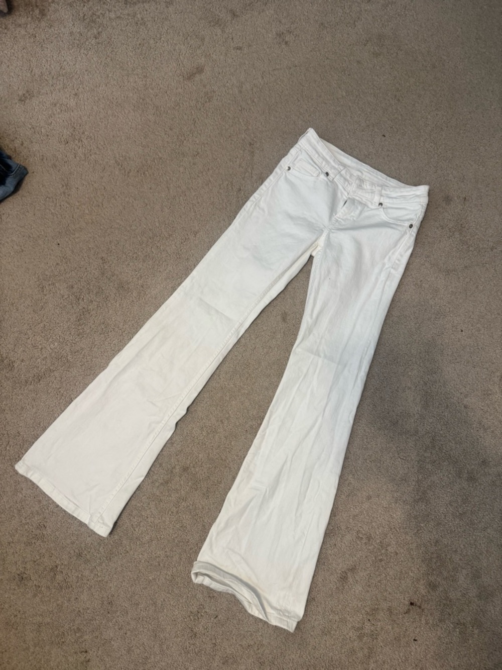 white low rise flare jeans